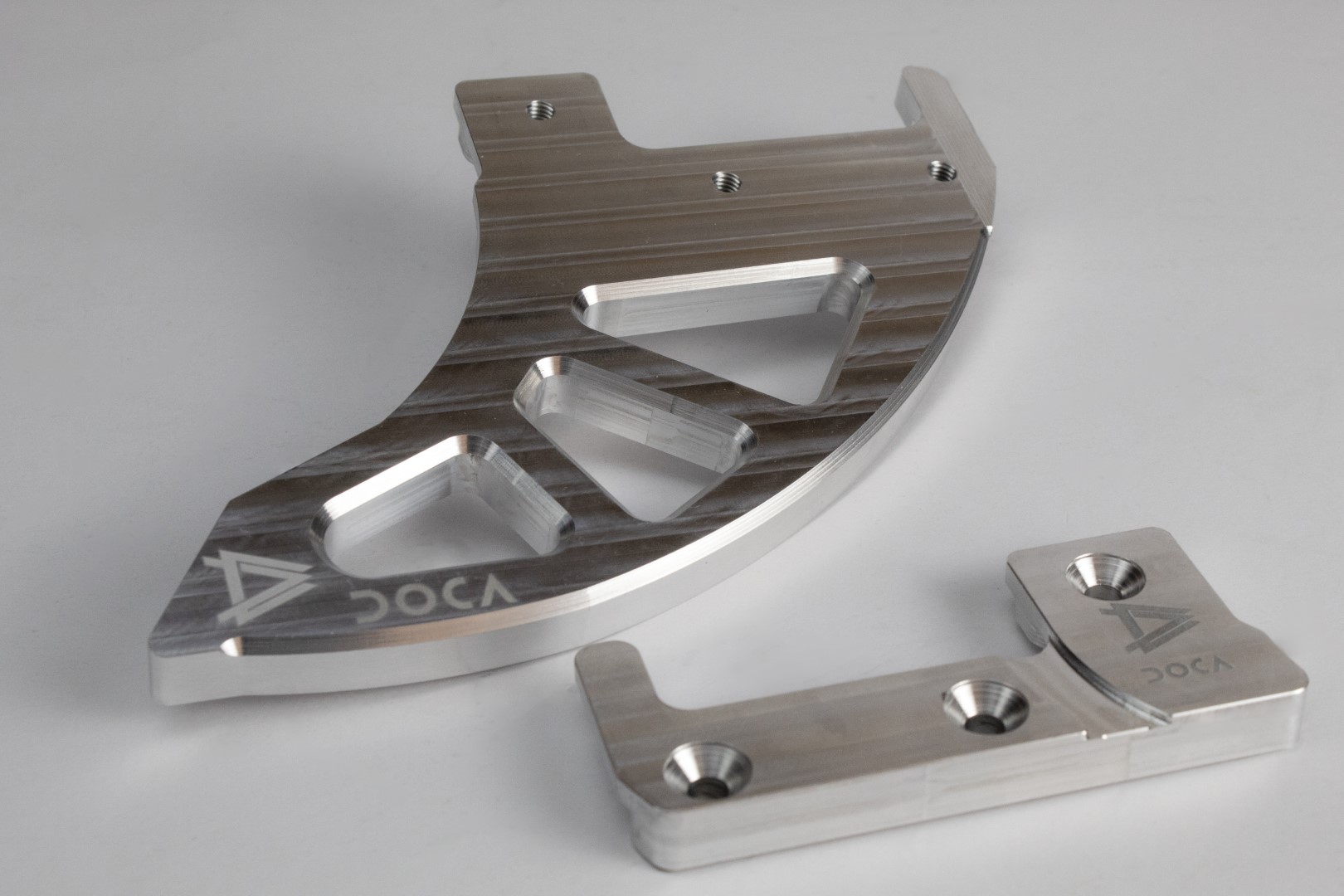 Proteção de Disco Traseiro DOCA – KTM / Husqvarna (Montagem no Suporte da Pinça)